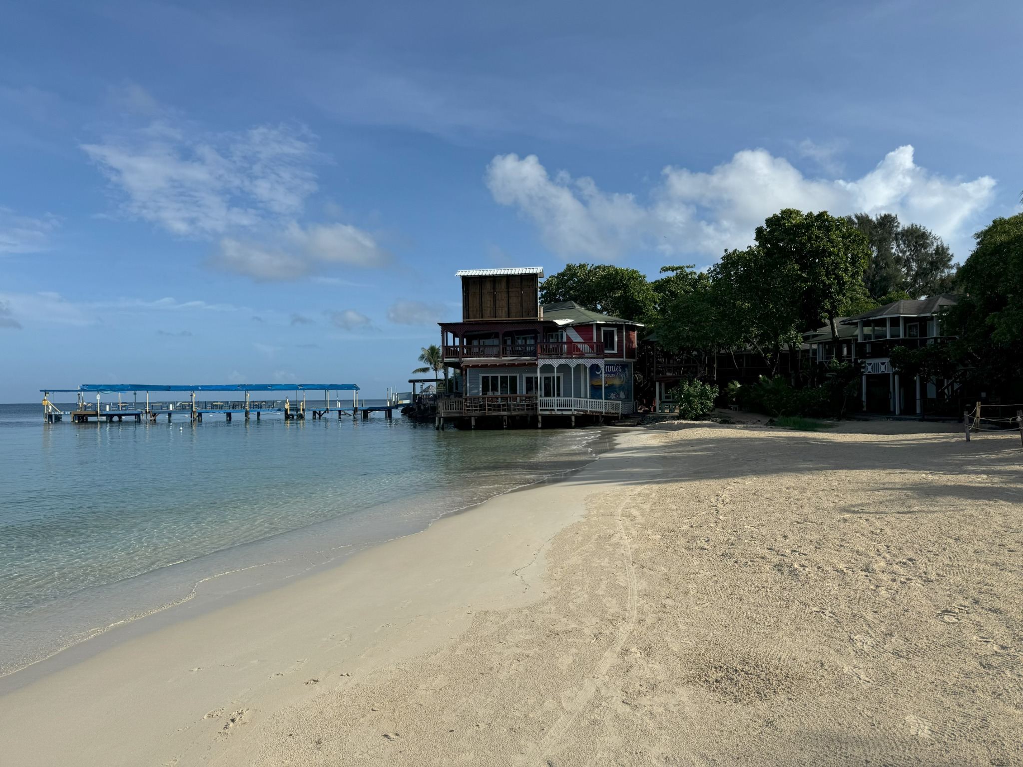 West Bay Beach dock and turquoise water for Roatan arrival planning
