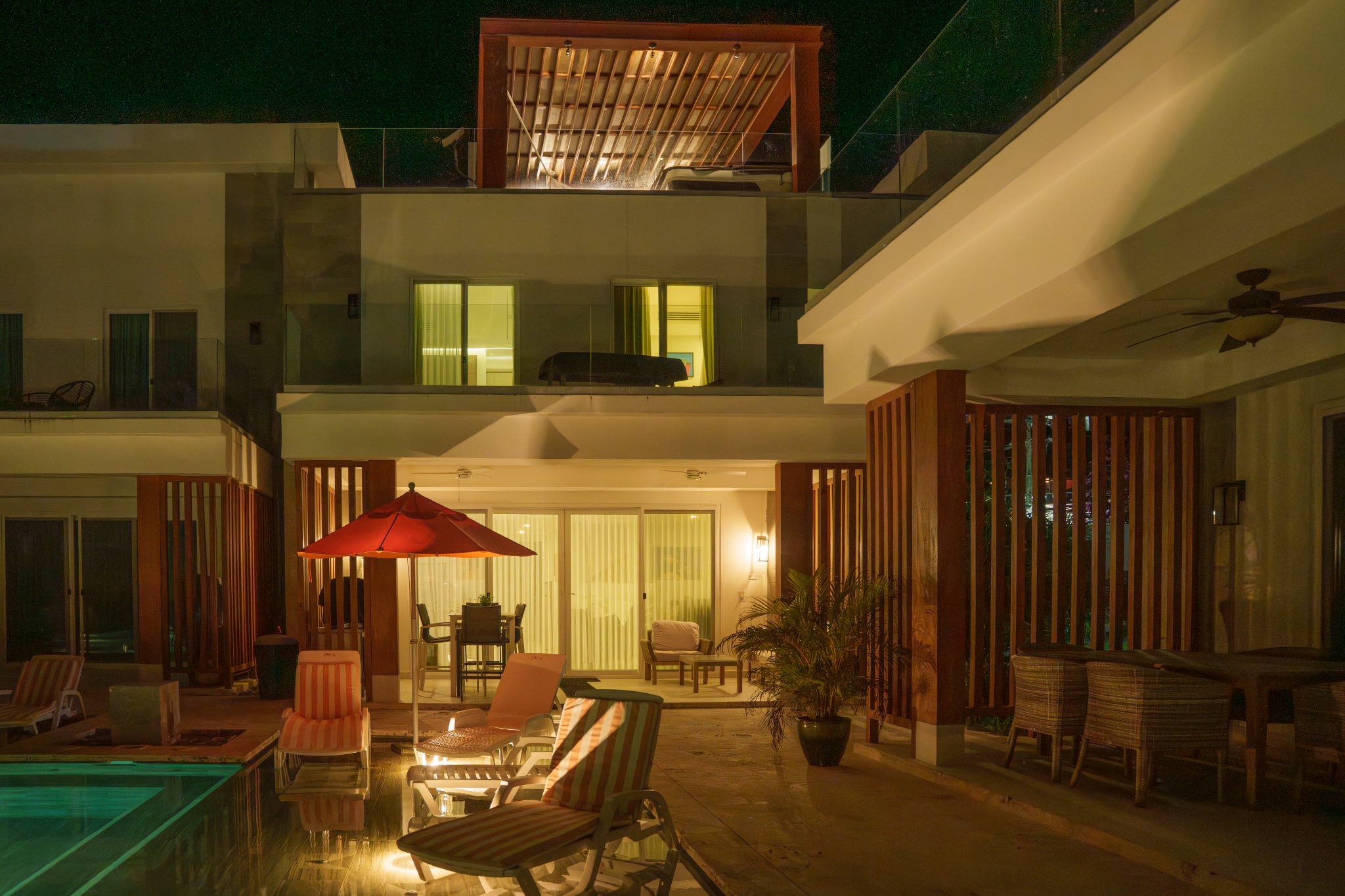 Sea Turtle Villa pool and patio glowing after sunset