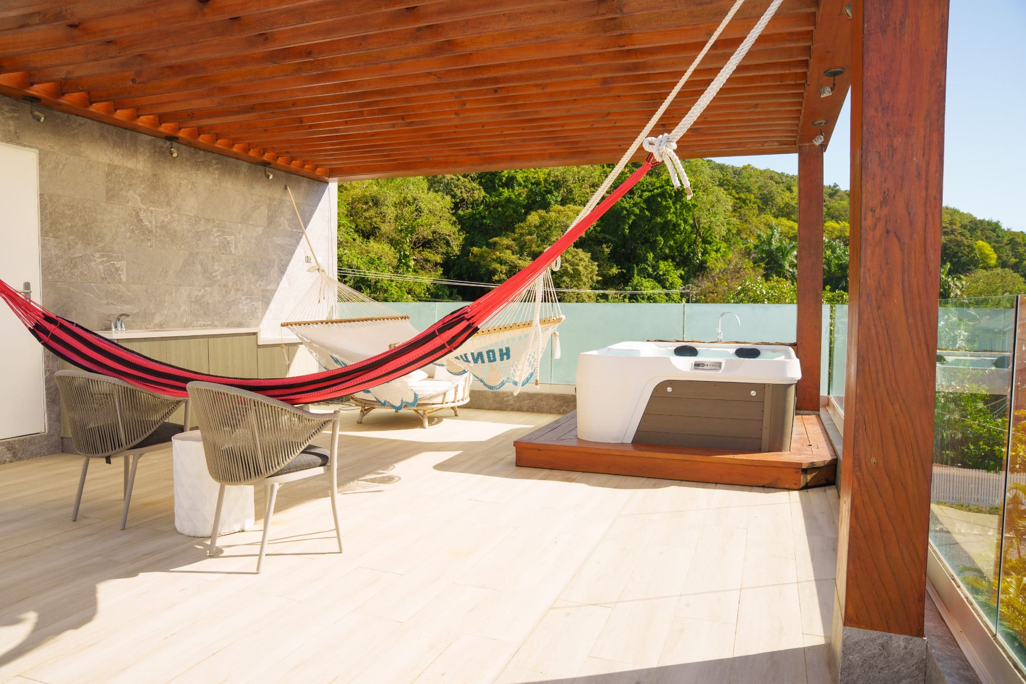 Rooftop hot tub and hammocks